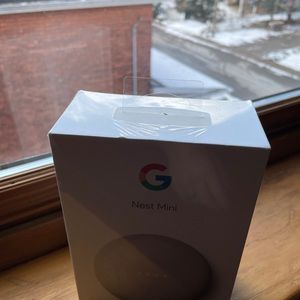 Brand new still sealed Google Home Mini!